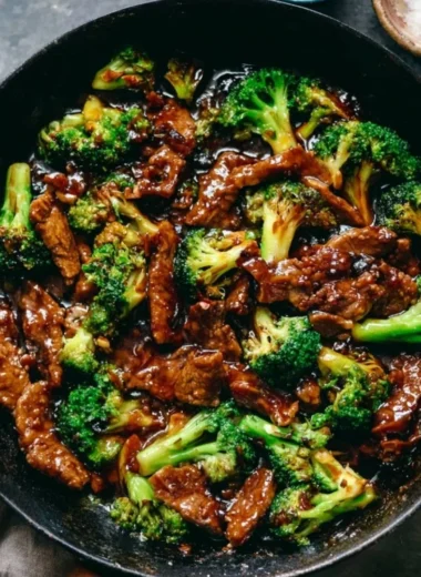 Delicious Beef and Broccoli dish served with rice on a plate