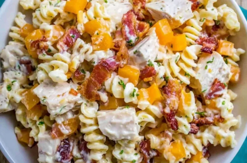 Delicious Chicken Bacon Ranch Pasta Salad with creamy dressing, chicken, and bacon.