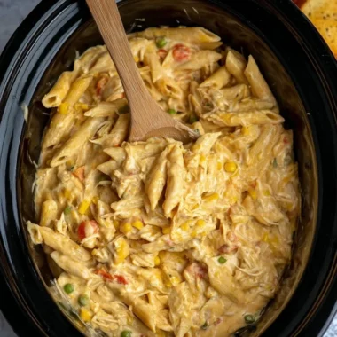 Crock Pot Chicken Pot Pie Pasta served in a bowl, showcasing creamy chicken and vegetables.