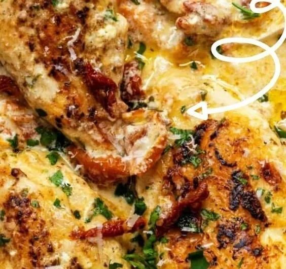 Crock Pot Marry Me Chicken served with creamy sauce and herbs