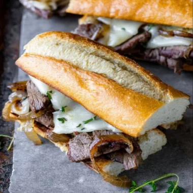 Delicious steak sandwiches with fresh toppings on toasted bread