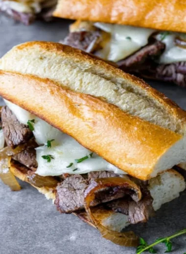 Delicious steak sandwiches with fresh toppings on toasted bread