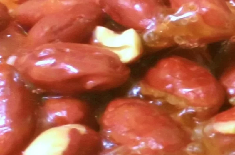 Delicious homemade peanut brittle in a dish ready to enjoy.