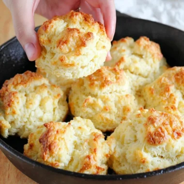 A plate of freshly baked easy drop biscuits ready to enjoy.