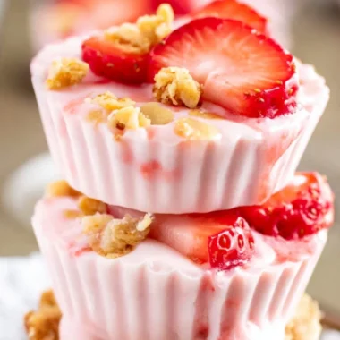 Frozen strawberry yogurt bites on a colorful plate, a healthy snack option