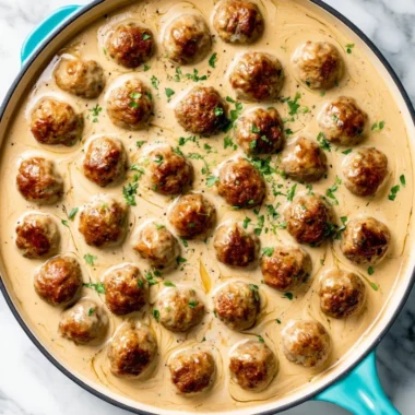 Delicious homemade IKEA meatballs served with gravy and lingonberry sauce