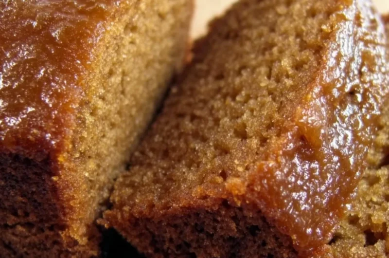 Delicious Honey Applesauce Cake topped with a drizzle of honey