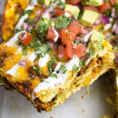 Delicious Mexican breakfast casserole topped with fresh ingredients