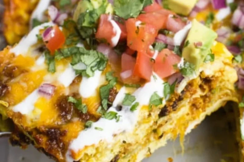 Delicious Mexican breakfast casserole topped with fresh ingredients