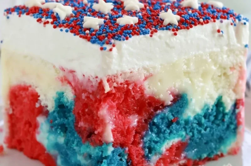 Patriotic Poke Cake dessert with red, white, and blue colors for 4th of July