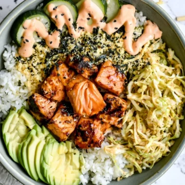 Delicious Spicy Salmon Maki Bowl topped with fresh ingredients and spices