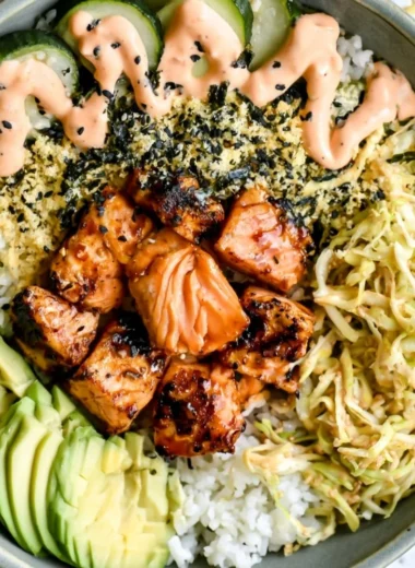 Delicious Spicy Salmon Maki Bowl topped with fresh ingredients and spices