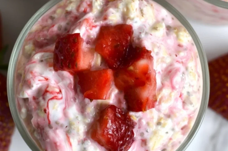 Strawberries and Cream Overnight Oats topped with fresh strawberries