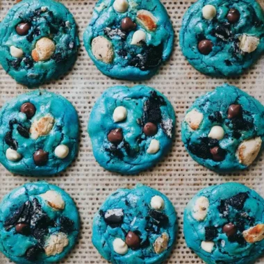 Delicious Cookie Monster Cookies with blue frosting and chocolate chips