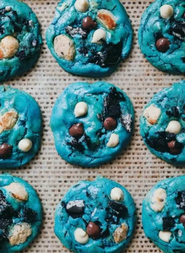 Delicious Cookie Monster Cookies with blue frosting and chocolate chips
