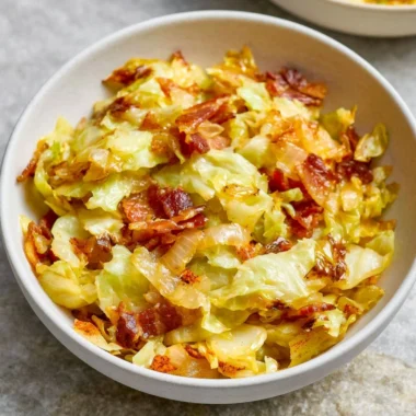Delicious Bacon and Cabbage Stir Fry served in a skillet.