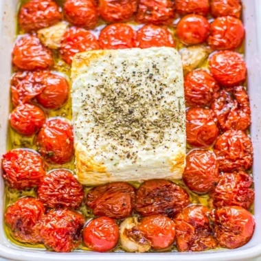 Baked feta pasta with cherry tomatoes served in a bowl