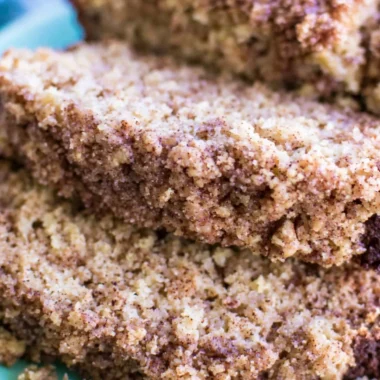 Delicious Coffee Cake Banana Bread slice on a plate with coffee