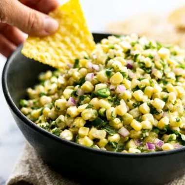 Bowl of Copycat Chipotle Corn Salsa with fresh ingredients