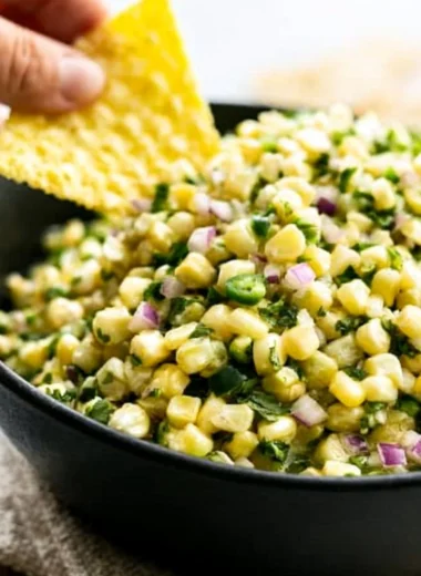 Bowl of Copycat Chipotle Corn Salsa with fresh ingredients