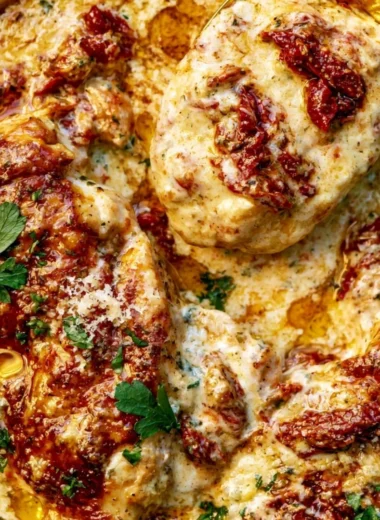 Crock Pot Marry Me Chicken served with creamy sauce and fresh herbs.