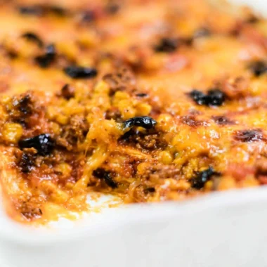 Delicious easy taco bake recipe with layers of cheese and spices.
