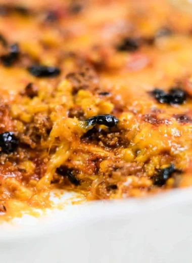 Delicious easy taco bake recipe with layers of cheese and spices.