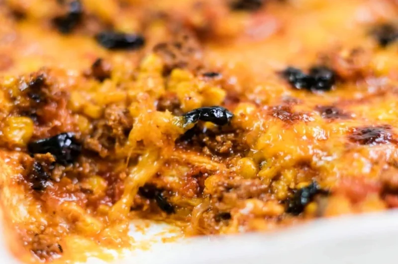 Delicious easy taco bake recipe with layers of cheese and spices.