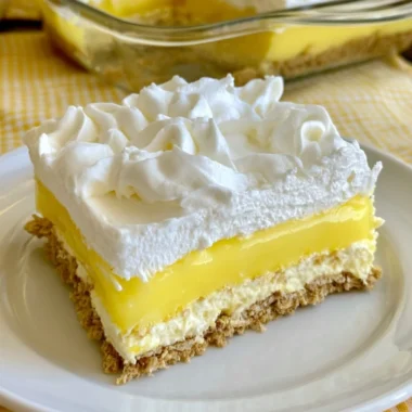 Lemon Delight dessert showcasing a vibrant lemon topping and creamy texture.