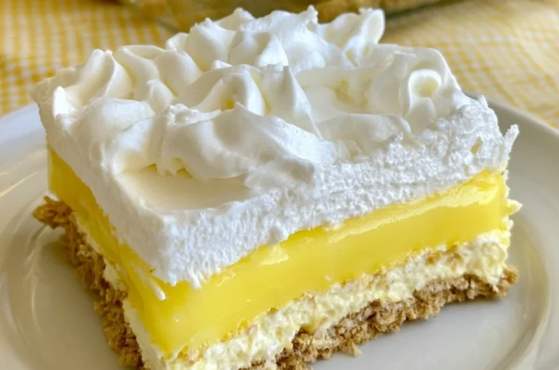 Lemon Delight dessert showcasing a vibrant lemon topping and creamy texture.