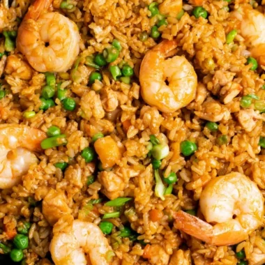 Shrimp fried rice with yum yum sauce served in a bowl