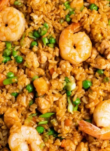 Shrimp fried rice with yum yum sauce served in a bowl