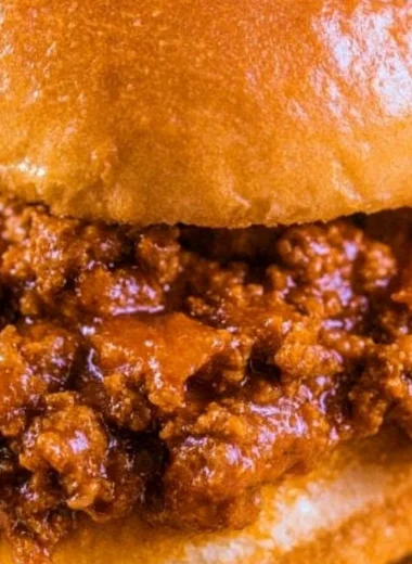 Delicious ultimate sloppy joes served with fresh toppings on a bun