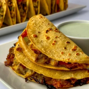 Healthy breakfast tacos filled with fresh vegetables and eggs
